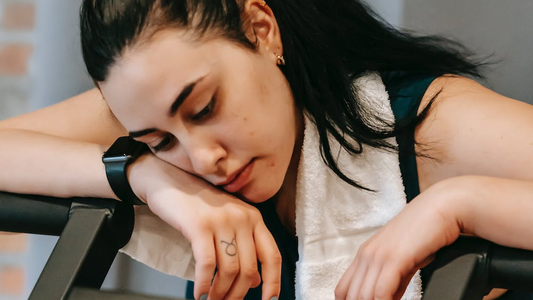 Women looking fatigued after exercise